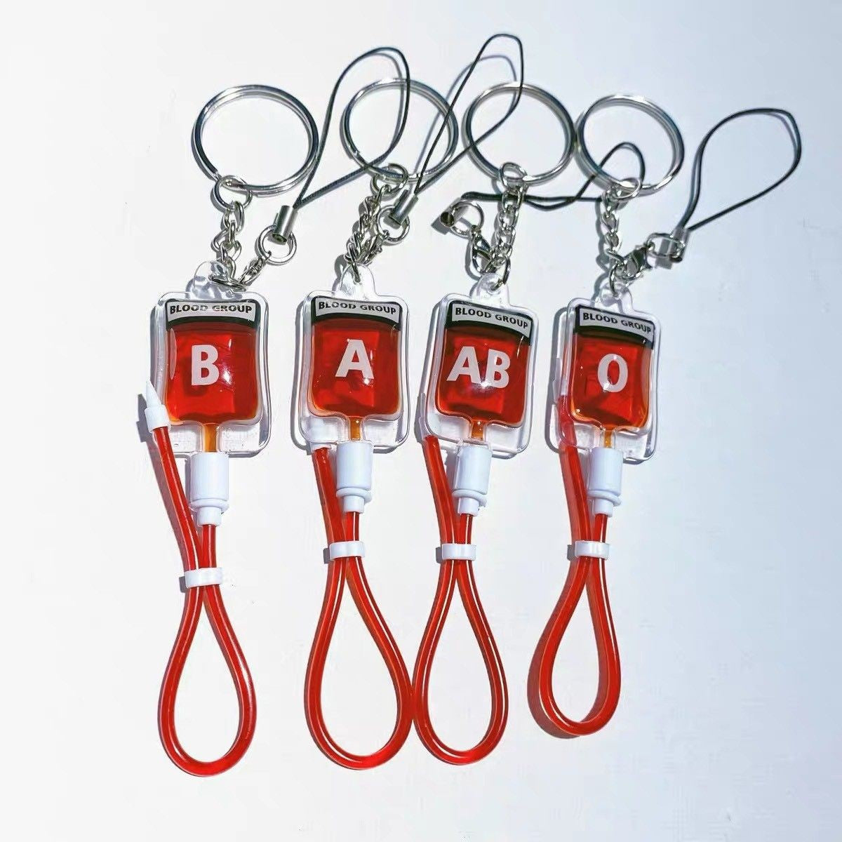 Wholesale Plasma Blood Bag Mobile Phone Pendant Keychain